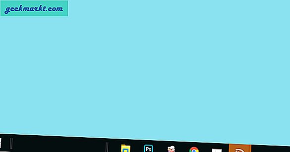 วิธีตั้งศูนย์ไอคอนแถบงานใน Windows 10
